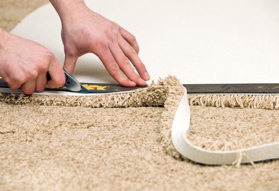 cutting tan carpet with a utility knife